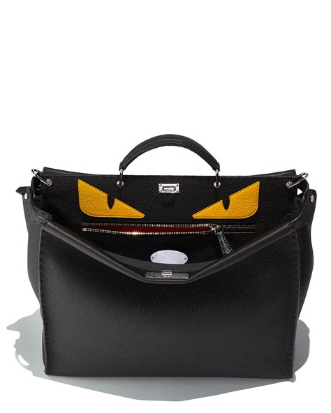 black fendi backpack with yellow eyes|fendi backpacks for men.